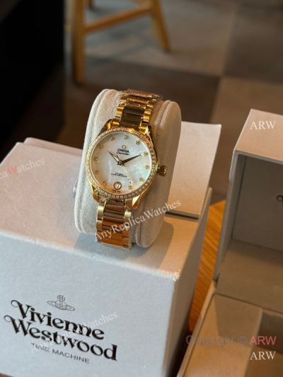 High Quality Replica Omega Gold strap Different Colors Face Dial White Diamonds Ceramic Bezel Lady Watch 34mm